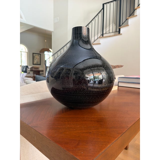 A rare and highly collectible limited-edition art glass vase designed by acclaimed Swedish artist and designer Ingegerd...