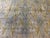 Allover Ikat design with diamond pattern on ivory field. Hand knotted with 100% pure wool pile, in soft color palette on...