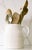Early 20th Century English ironstone pitcher. We love it's pretty raised banding design giving it much character...