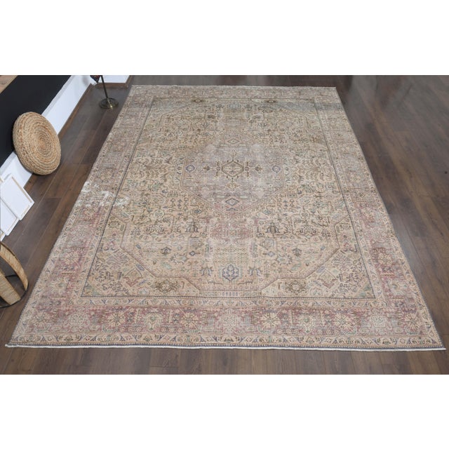 Vintage Persian Hand-Knotted area rug is a semi-antique vintage area rug. The '70s Eastern region of Anatolian's unique...