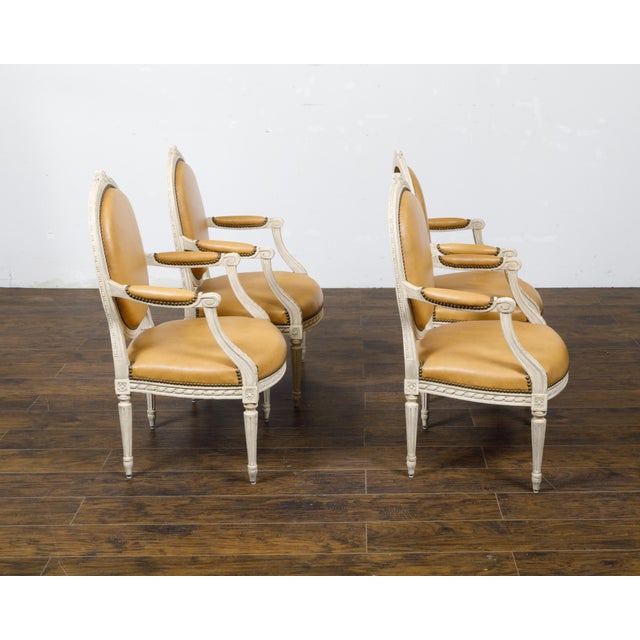 Set of Four French Louis XVI Style 1900s Oval Back Painted and Carved Armchairs For Sale - Image 4 of 12