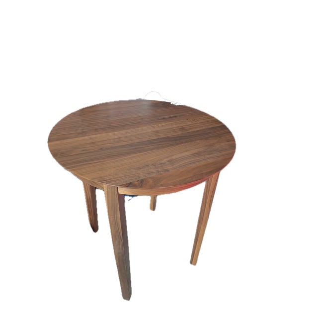 This is a brand new custom built Mavin table. It is 40x40 with solid Shaker style legs. The table is walnut with a natural...