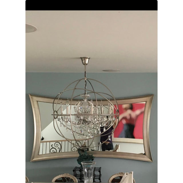 Restoration Hardware’s 32” Foulcault’s Orb chandelier with crystal in nickel color.