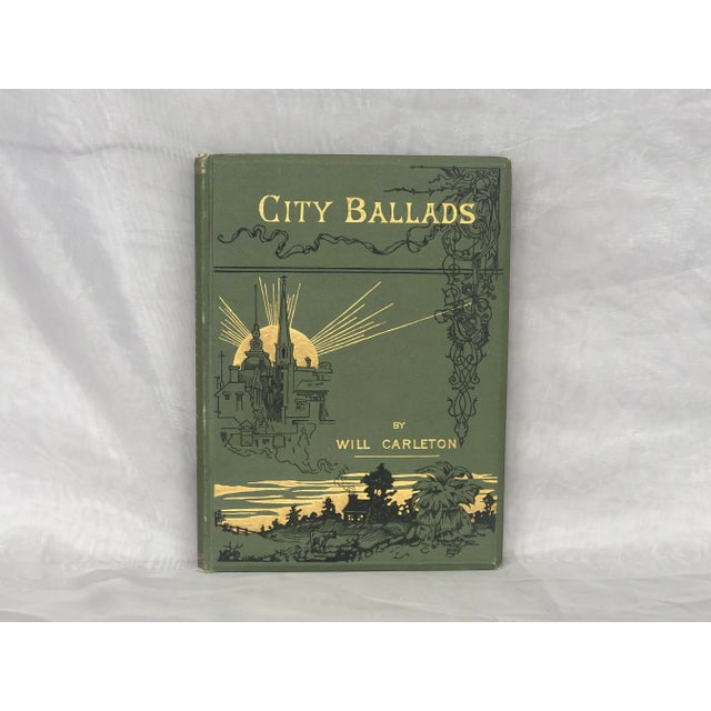 With its cover illustration of a sunrise over a cityscape, this beautiful antique book would make a unique decor accent on...