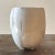 Add a touch of bohemian flair to your decor with this stunning vintage geometric pottery vase. Crafted with intricate...
