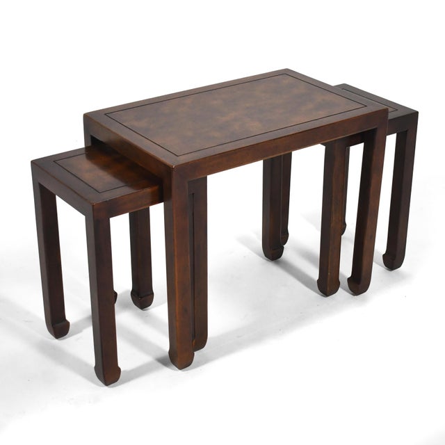 A handsome and nicely detailed set of three tables. Attributed to Henredon. The large table is 20"h X 24"w X 15"d The two...