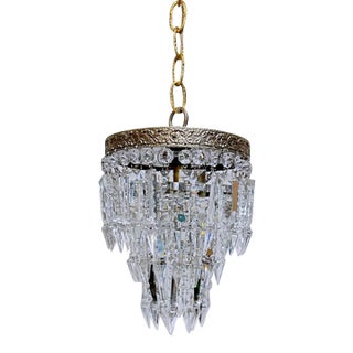 Vintage Hollywood Regency Crystal Waterfall Chandelier With Ornate Brass Frame For Sale