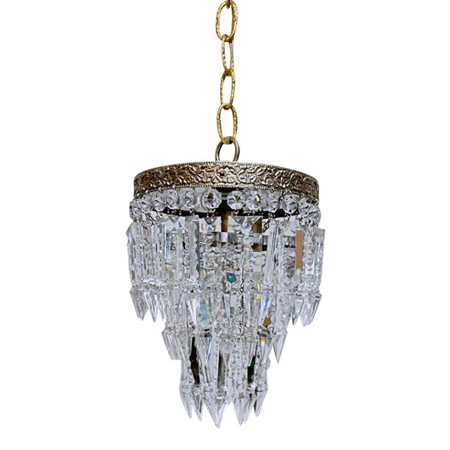 Vintage Hollywood Regency Crystal Waterfall Chandelier With Ornate Brass Frame For Sale