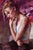 In "Up All Night," a figure sits in contemplative solitude, her expression conveying a sense of introspection and...