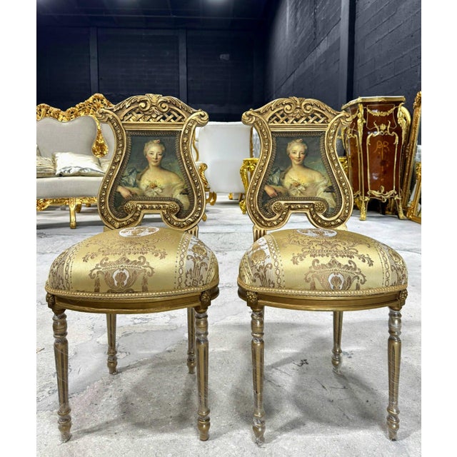 Elevate your home décor with this exquisite French Rococo accent chair. Fully refinished with radiant gold leaf, it...