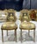 Elevate your home décor with this exquisite French Rococo accent chair. Fully refinished with radiant gold leaf, it...