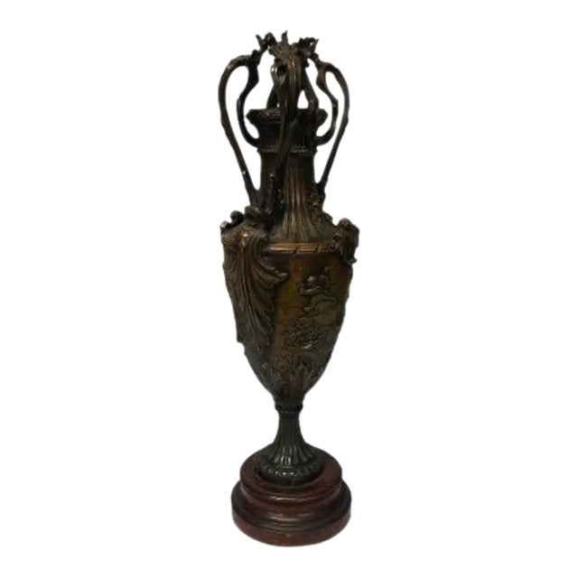Antique Dark Patinated Brass Decorative Urn With Wood Base For Sale