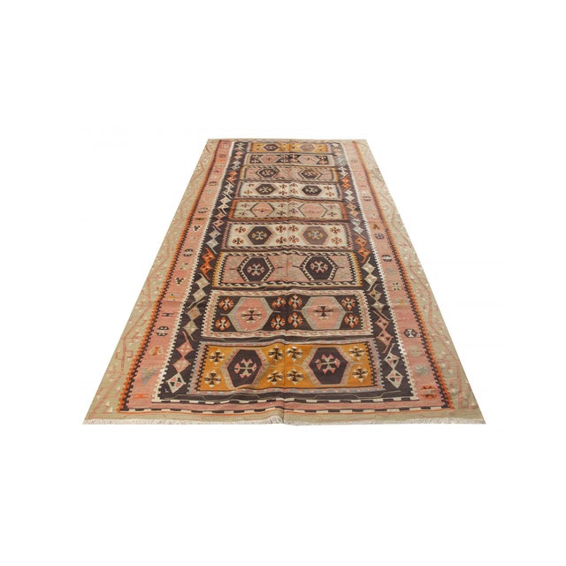 Vintage handwoven decorative kilim rug from Chorum region of Turkey. Approximately 50-60 years old. In very good condition.