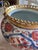 This is a 19th century Japanese Imari porcelain vessel featuring traditional hand-painted floral and bird motifs in the...