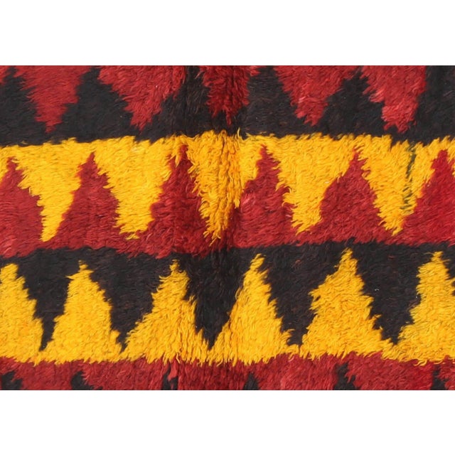 This Vintage Turkish Tulu Rug is handcrafted in the Konya region of Central Turkey using Angora wool on a wool kilim...