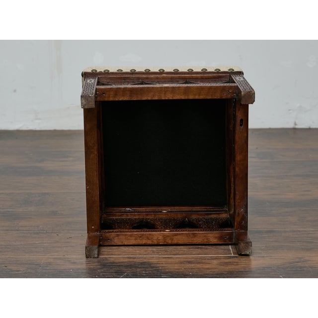 This circa 1900 Moroccan stool showcases intricate hand-carved details and delicate bone inlay, creating a striking...
