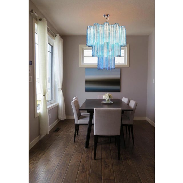 Italian vintage chandelier in Murano glass and nickel-plated metal structure. The armor polished nickel supports 48 large...