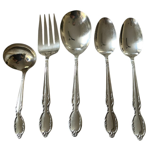 Elegant vintage Rogers Royal Manor silverplate flatware set, introduced in 1956, featuring a classic mid-century floral...