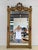 Exceptional large 19th century French Louis XVI carved and giltwood mirror. Featuring intricately carved flowers,...