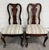 This is a stunning pair of vintage Queen Anne style dining chairs. They feature beautiful cabriole legs, a carved back...