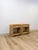 This pair of vintage wicker nightstands showcases a graceful arched silhouette, offering a softer, more sculptural...
