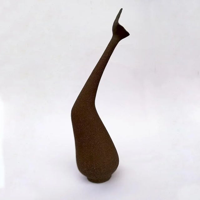 This is a Roberto Rigon terracotta vase-shaped sculpture. The piece is irregular, with abstract decoration with enamel.