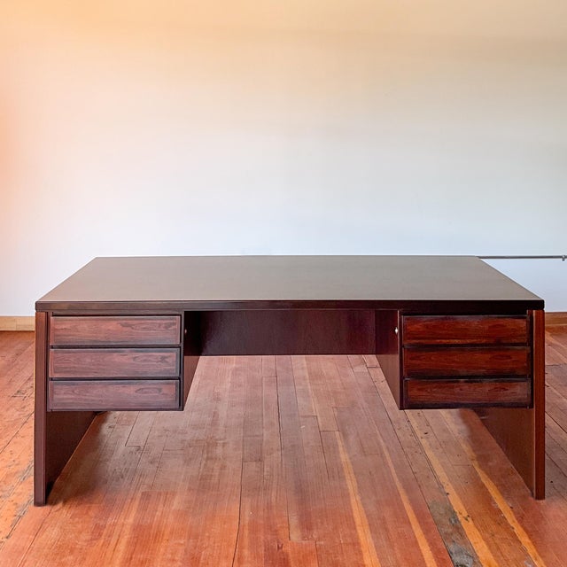 Stunning mid century modern Danish rosewood executive desk. A true executive desk with ample size and storage. Four...