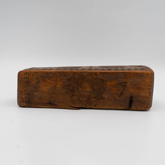 A rare Scandinavian Carved and Hallowed out Candle Box (No Joinery) with bas relief carved hex motifs as well as initials...