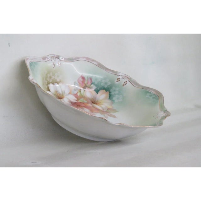This gorgeous bowl is made of porcelain. This piece is stamped as having been made by RS Germany, see pictures, and the...