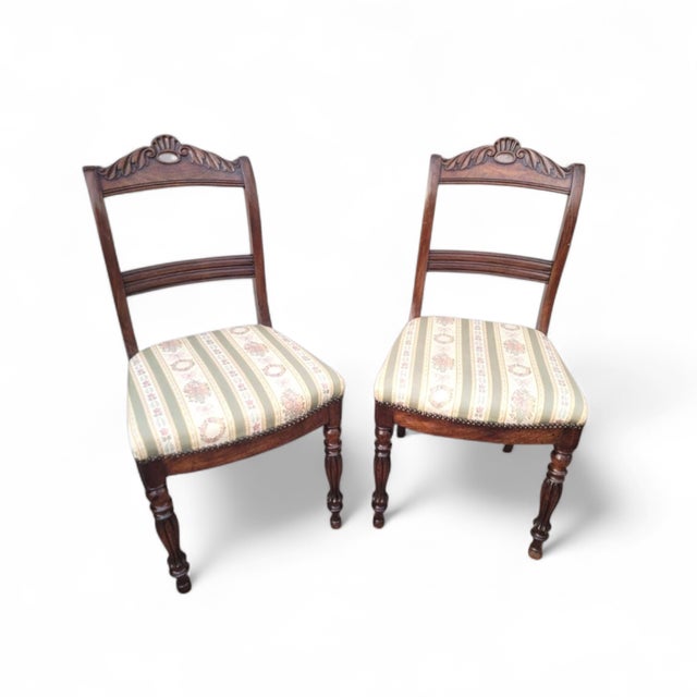 Pair of French Antique Louis Philippe Dining Chairs, Solid Nut Wood, 19th Century This refined pair of French antique...