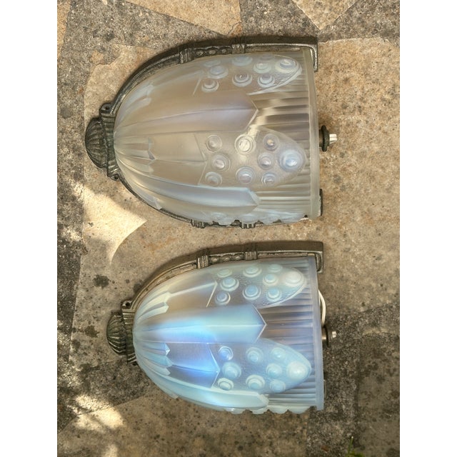 Pair of art deco wall sconces by georges leleu, 1930-1940 magnificent pair of opalescent glass wall sconces, signed g....