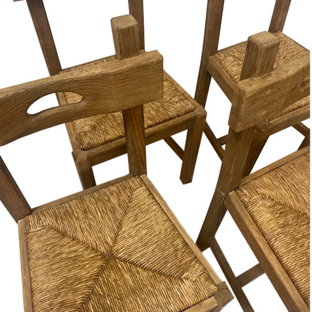 This truly stunning set of 4 rush seat dining chairs are made of handwoven rushing and textured brushed oak. Each chair is...