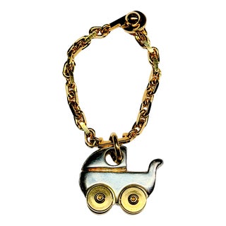 Mid-Century Silver- and Gold-Plated Baby Carriage Artist Pendant Jewelry in the style of Cartier, 1960s For Sale
