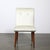 This pair of Art Deco button-back chairs by Russel Wright for the Conant Ball Company, crafted circa 1940, beautifully...
