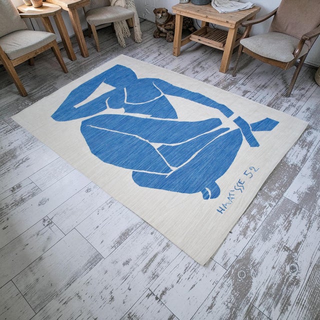 Handwoven in the esteemed weaving region of Oushak in Aegean Anatolia, this striking contemporary flatweave tapestry...