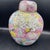 This is a colorful thousand flowers or Mille Fleurs Ginger Jar.. There’s definitely gilt paint as well. It’s fun, and it’s...