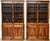 A very fine and unusual pair of English two-tiered bookcases of figured wood from the Edwardian era, crafted in the...