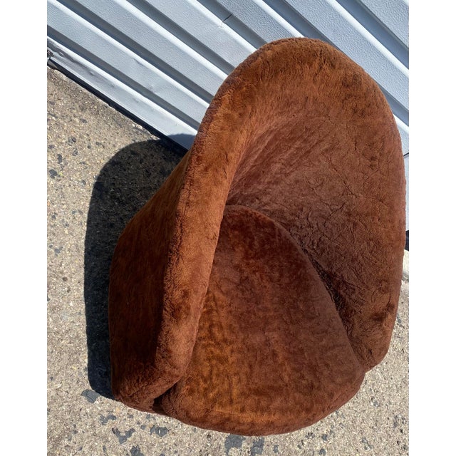 Rocking/ Swivel Club Chair in the Style of Adrian Pearsall and Milo Baughman. Faux Brown fur upholstery. Bent wood round...