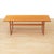 This sleek vintage mid-century coffee table was manufactured in Denmark during the 1970s. Teak construction with a...