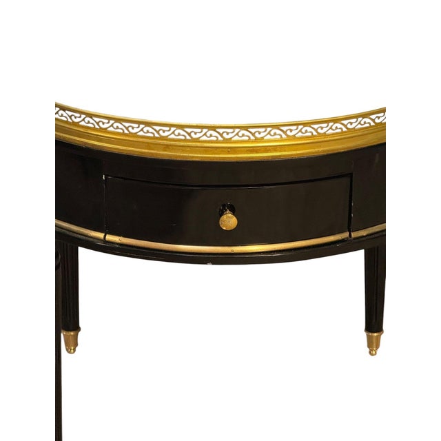 The French Louis XVI Style Black Side Table is a luxurious and elegant piece of furniture that adds a touch of...