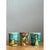 This set of cylindrical cups showcases bold, hand-painted abstraction in a vivid palette of turquoise and lime green, each...