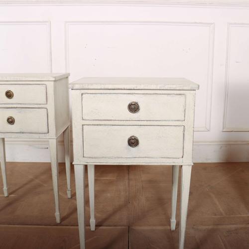 Pair of early 20th Century Swedish two drawer bedside tables with later paint. This piece is designed in the style of the...