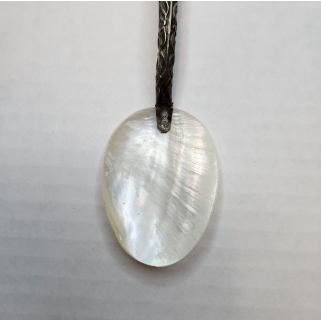 Elevate your next classic entertaining or raw bar presentation with this charming mid-century caviar serving spoon....