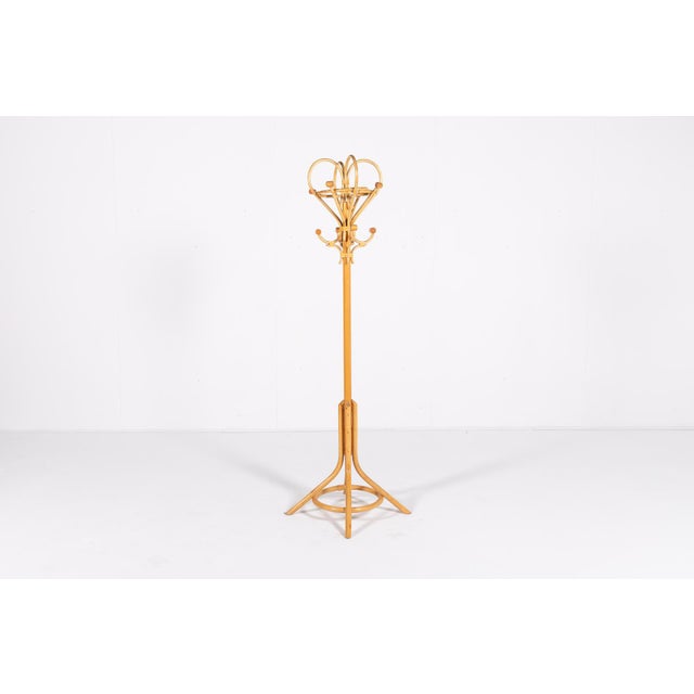 Vintage Italian bamboo-rattan coat hanger with leather decorations.Condition Good, age related wear and marks. I have...