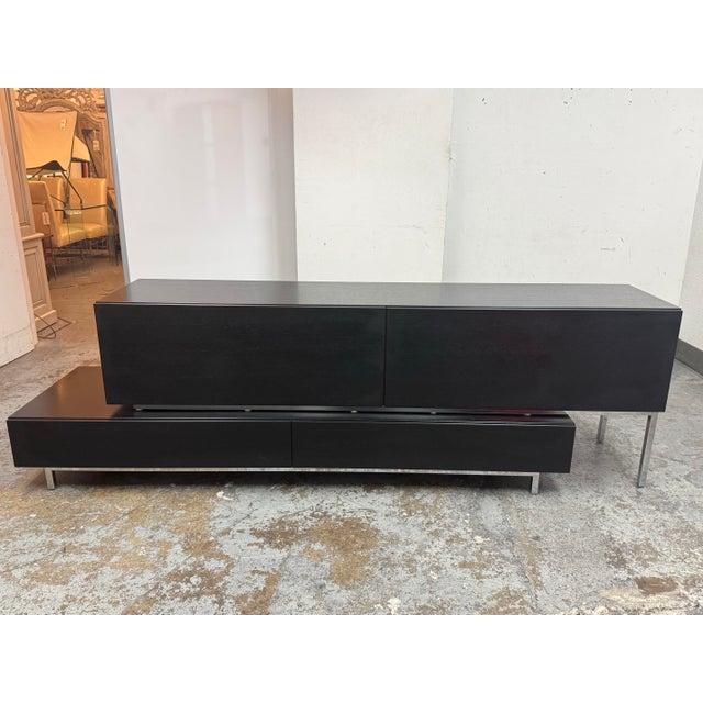 Design Plus Gallery presents a Volani Two Piece Media Console + Wall Mounts from BoConcept. The Volani series is now known...