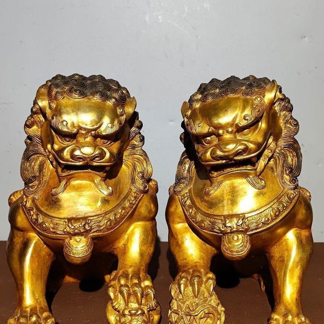 Asian Pair of Large Vintage Gilt Bronze Guardian Lions – Seated Foo Dogs With Brocade Balls For Sale - Image 3 of 9