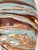 Vintage Niloak mission swirl pottery vase featuring a marbled design of blue, brown, and rust clays. This is a pre-owned...