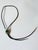 Beautiful multi-stone inlaid bolo tie with vintage Bennett-style tension clamp. Stamped silver end caps. Masterfully...