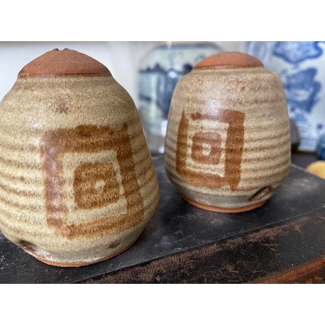 Fantastic vintage pepper and salt, shaker, signed and dated on the bottom 1980. Each presented with a wide body that...