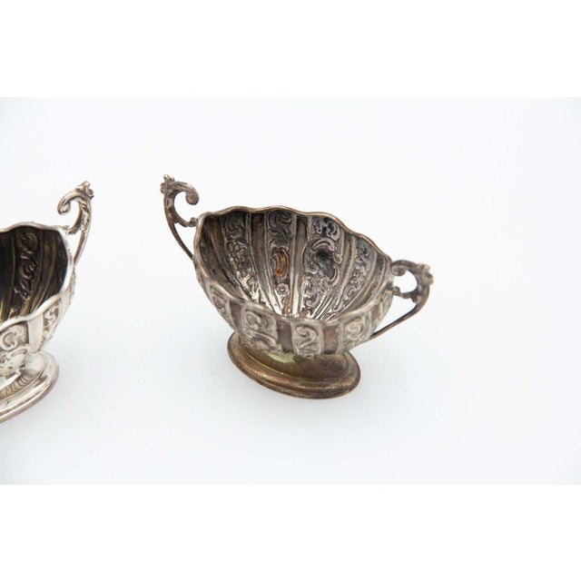 Silver Salt Shakers with Elliptical Bases and Reliefs, Set of 2, in Good conditions. Designed 1890 to 1919